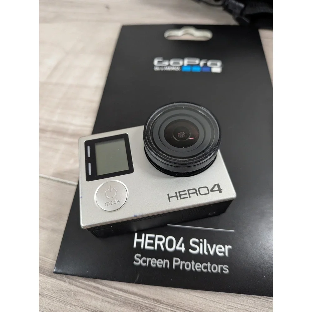 GoPro Hero 4 Silver Edition- with Accessories and Case Included